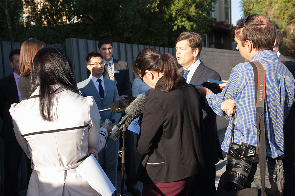 Minister for Roads and Road Safety Luke Donellan talking to the media.