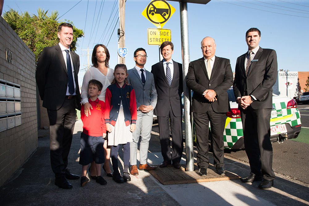 Wade Noonan member for Williamstown, Samantha McArthur MTAG President, Mayor of Maribyrnong Nam Quach, Minister for Roads, Road Safety and Ports, Luke Donellan, CEO of the VTA Peter Anderson, Adam Maquire, Regional Director, Metro North West at VicRoads along with Kingsville Primary School students William McArthur and Edith Dillon.
